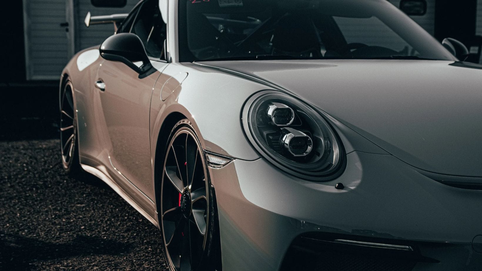 Silver Porsche 911 front three-quarter view