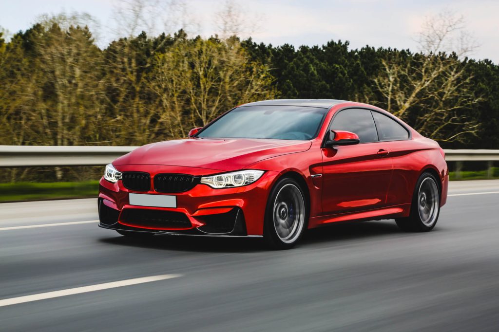 Lux Detailer FAQ premium detailing red luxury sedan