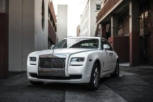 White luxury sedan detailed to a mirror finish