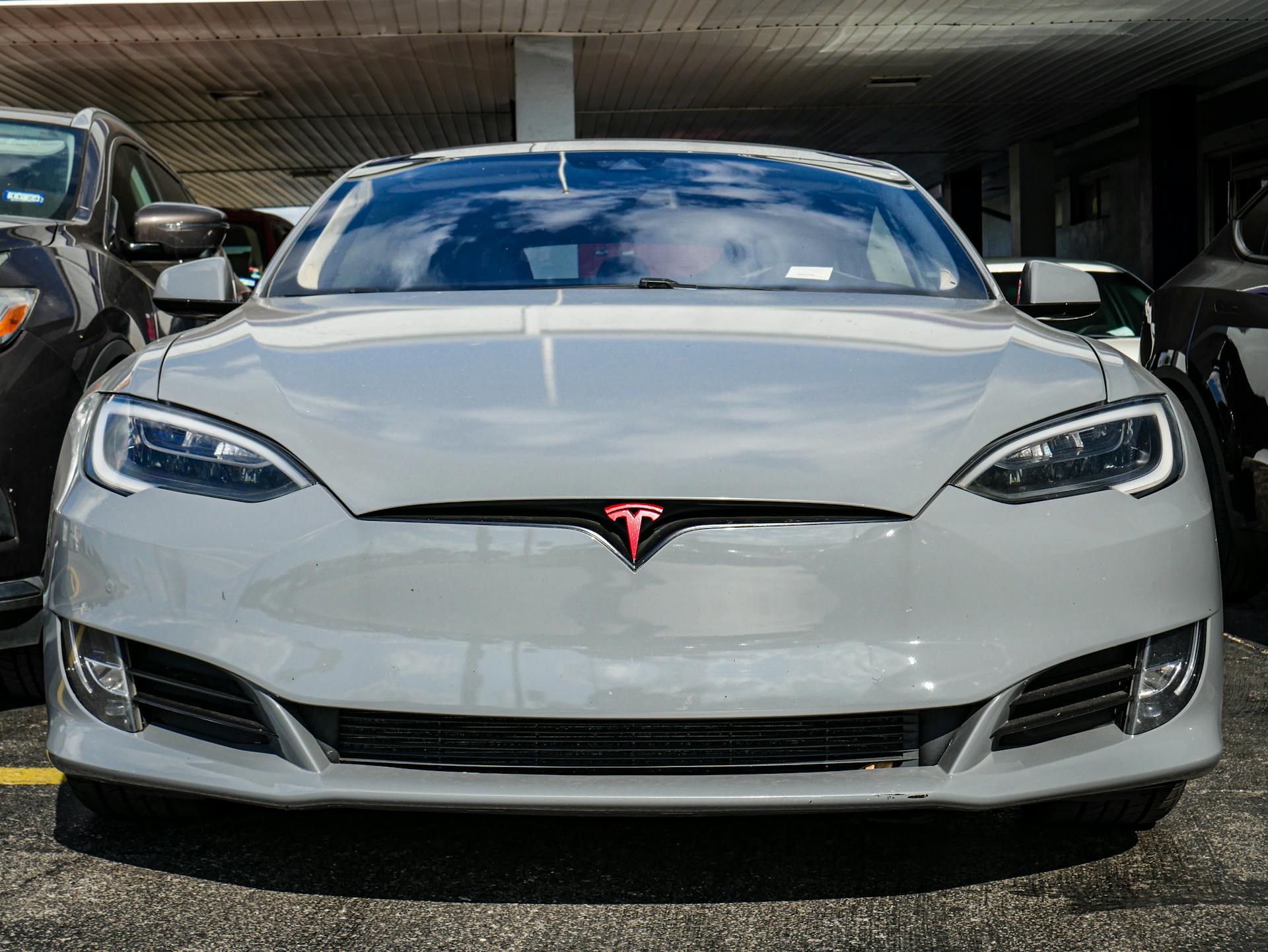 White Tesla Model S photographed head on