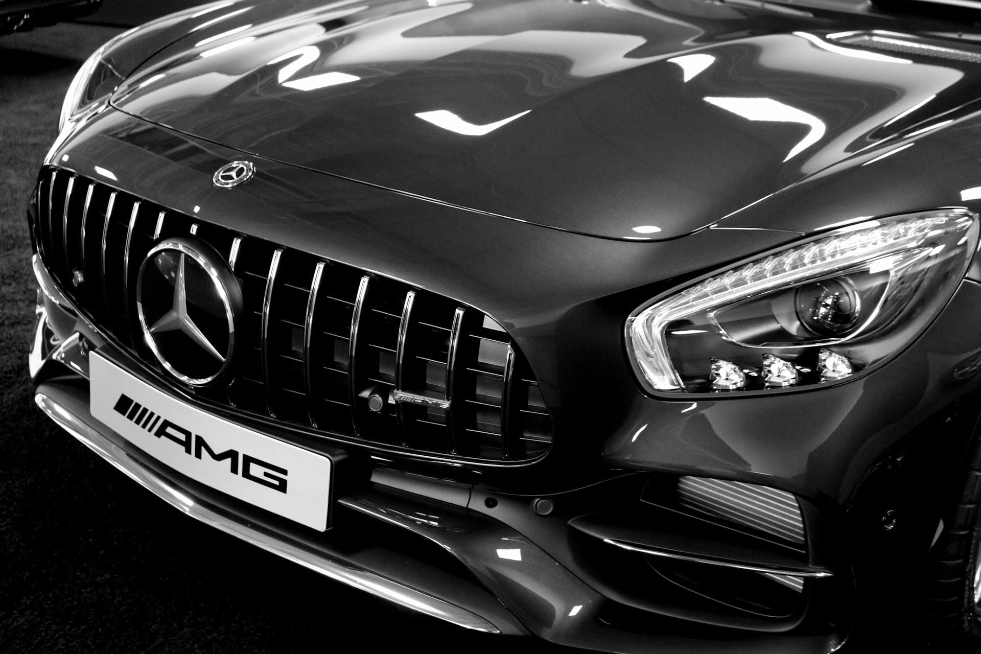 Black Mercedes-AMG front end with a deep gloss finish