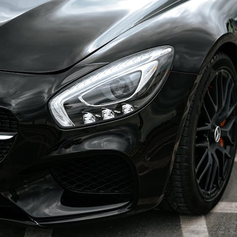 Car Detailing in Garden City, GA: Mobile Detailing Near Savannah 1 Glossy black sports car front after detailing