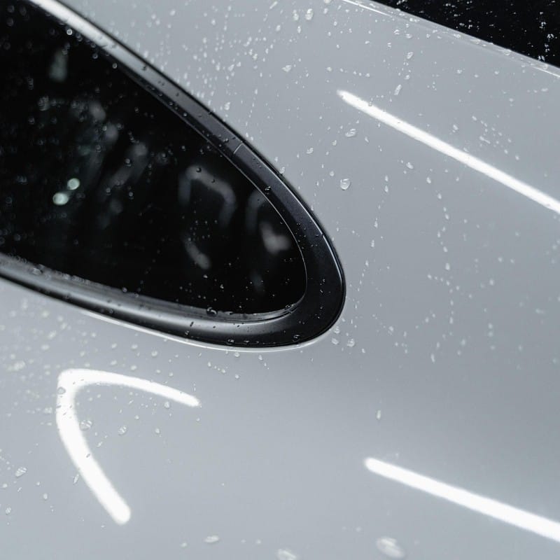 Water beading on a ceramic coated car panel